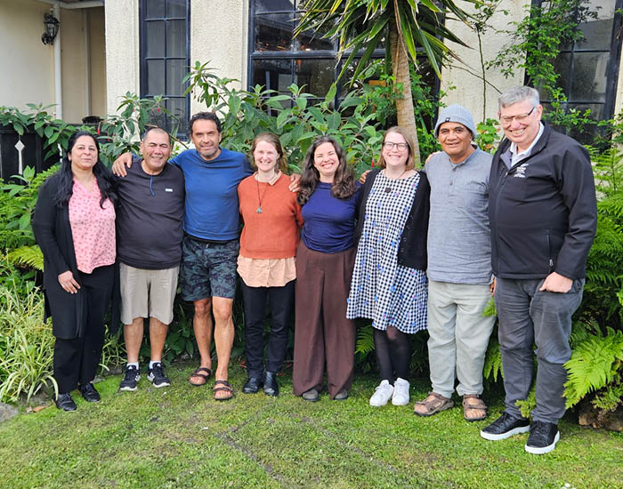 Group of people standing in a row